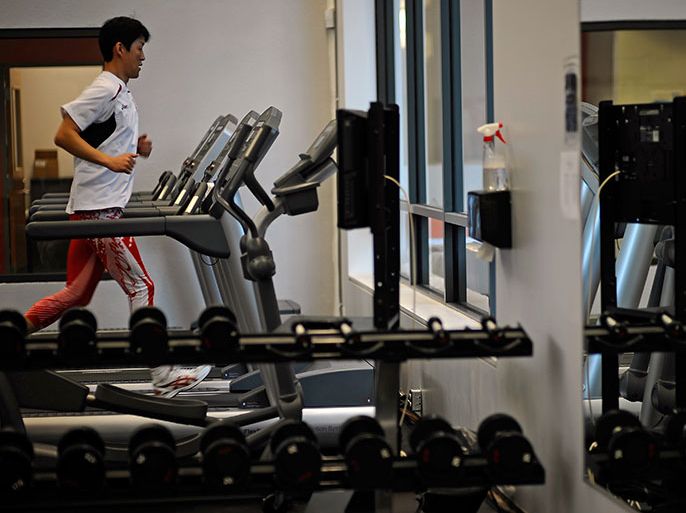 A member of the Japanese team runs on a treadmill in the fitness center at the Whistler Athletes Village in advance of the Vancouver 2010 Olympic Games in Whistler, Canada 10 February 2010. EPA/CJ GUNTHER