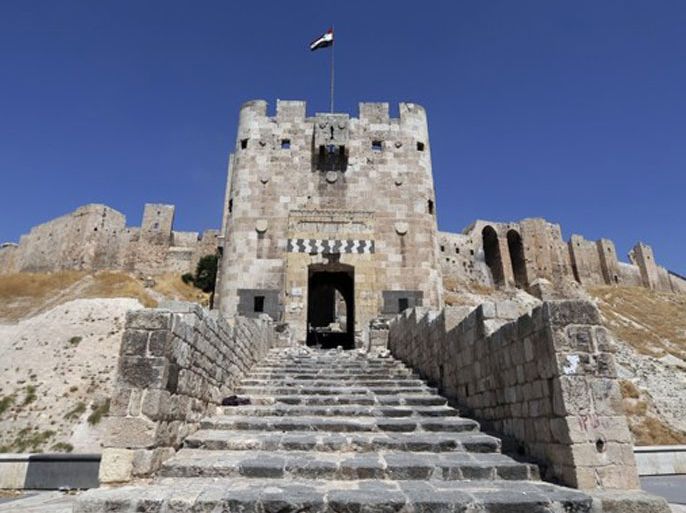 JOSEPH EID/AFP/GETTY IMAGES - A general view shows Aleppo's historical citadel, where today Bashar al-Assad’s forces have taken position inside to shell their enemies, and Syrian opposition fighters say they are desperate to capture it