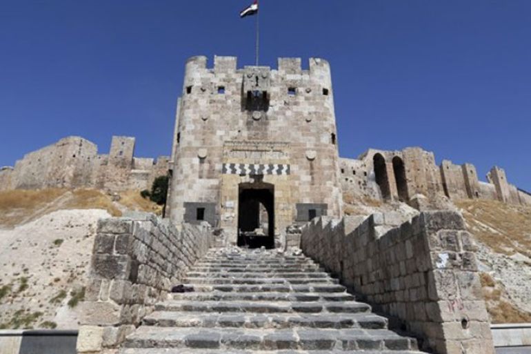 JOSEPH EID/AFP/GETTY IMAGES - A general view shows Aleppo's historical citadel, where today Bashar al-Assad’s forces have taken position inside to shell their enemies, and Syrian opposition fighters say they are desperate to capture it