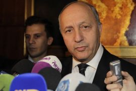 Amman, -, JORDAN : French Foreign Minister Laurent Fabius answers to journalists' questions as he arrives for the opening of the "Friends of Syria" meeting in Amman, Jordan on May 22, 2013. The gathering seeks to discuss US-Russian proposal to hold a peace conference dubbed "Geneva 2" to bring together rebels and representatives of Syrian President's regime. AFP PHOTO KHALIL MAZRAAWI