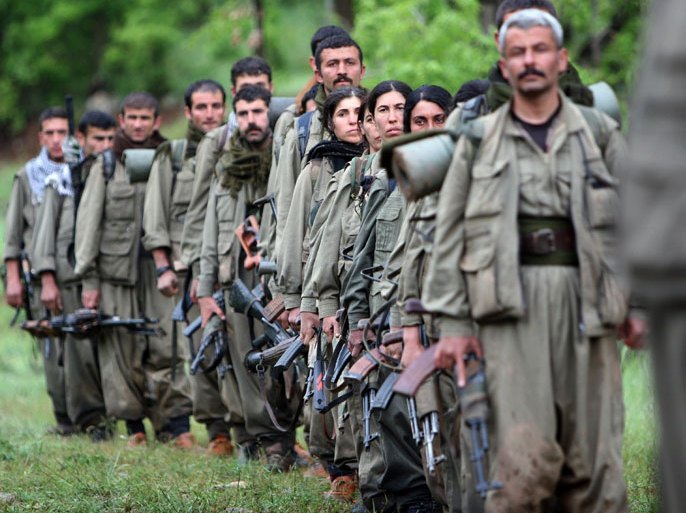 Kurdistan Workers' Party (PKK) fighters arrive in the northern Iraqi city of Dohuk on May 14, 2013, after leaving Turkey as part of a peace drive with Ankara. The PKK has fought a 29-year nationalist campaign against Ankara in which some 45,000 people have died, but is now withdrawing its fighters from Turkey as part of a push for peace with the Turkish authorities