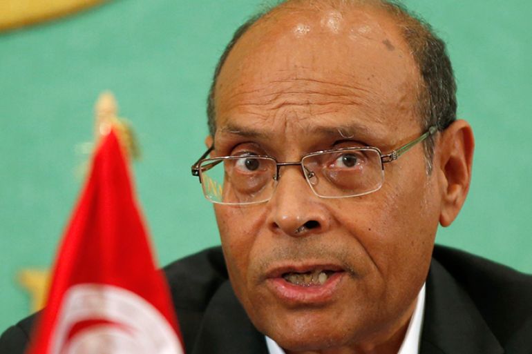 Tunisia's President Moncef Marzouki speaks during a news conference at the Japan National Press Club in Tokyo May 31, 2013. REUTERS/Toru Hanai (JAPAN - Tags: POLITICS)