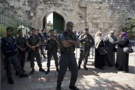 Israeli border guards stand guard outside the al-Aqsa mosque compound at Lion's Gate in Jerusalem's Old City on May 7, 2013 as police restricted the number of Muslim worshipers entering the Muslim holy site . AFP PHOTO/AHMAD GHARABLI