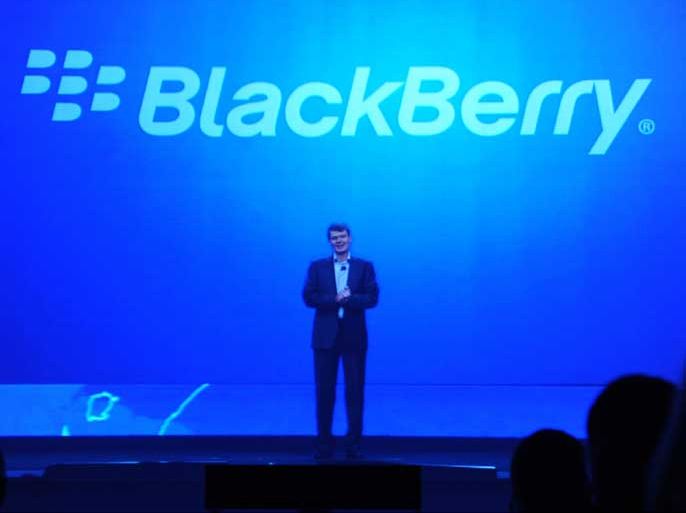 epa03561786 President and Chief Executive Officer of Resarch in Motion (RIM), Thorsten Heins, unveils the new BlackBerry touch screen handsets via video link from New York City at the Blackberry smartphone launch in London, Britain, 30 January 2013. RIM launched its new BlackBerry 10 smartphones 30 January. The company announced two new touch screen smartphones, the BlackBerry Z10 and the BlackBerry Q10. EPA/ANDY RAIN