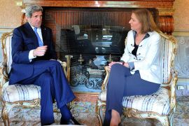U.S. Secretary of State John Kerry (L) talks to Israeli Justice Minister Tzipi Livni during their meeting at the U.S. Ambassador's residence in Rome May 8, 2013. Kerry and Livni had a talk about the peace process in the Middle East. REUTERS/Mladen Antonov/Pool (ITALY - Tags: POLITICS)