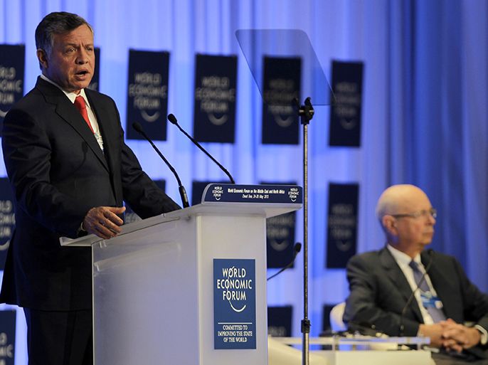 Jordan's King Abdullah II speaks during the opening session of the World Economic Forum on the Middle East and North Africa on May 25, 2013 on the shores of the Dead Sea, 55 kms southeast of Amman. AFP PHOTO/KHALIL MAZRAAWI