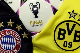 (FILES) - A file picture taken on May 2, 2013 shows jerseys of German football clubs Bayern Munich (L) and Borussia Dortmund pictured with an UEFA Champions League 2013 final official ball in Paris. Bayern and Borussia will face in an all-German UEFA Champions League 2013 final on May 25, the first time two Bundesliga clubs will meet for the European Cup. AFP PHOTO / FRANCK FIFE