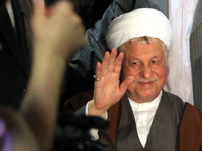 epa03696290 Former Iranian President Akbar Hashemi Rafsanjani waves as he registers his candidacy during the registration for Iran's upcoming presidential election on 14 June, in Tehran, Iran, 11 May 2013. Rafsanjani registered at the last moment on 11 May as a candidate. EPA/ABEDIN TAHERKENAREH