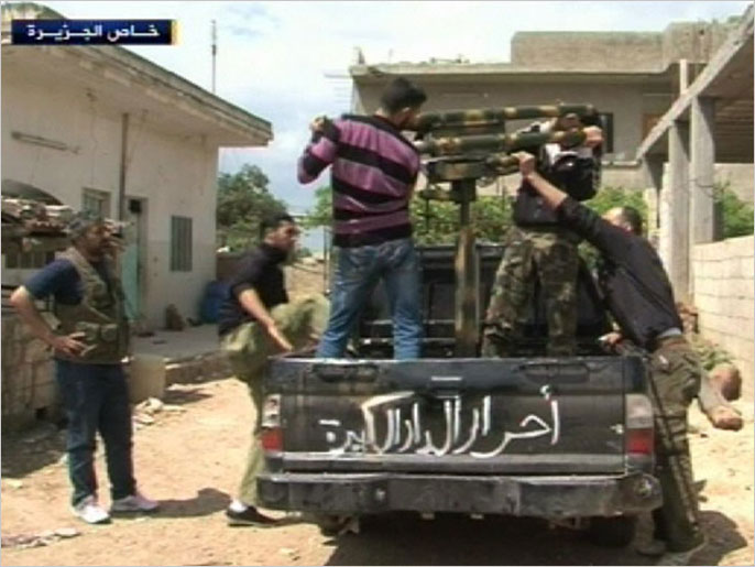 ‪الجيش الحر يواصل معاركه ضد قوات النظام وقوات حزب الله بحمص‬ (الجزيرة)