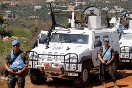 U.N peacekeepers of the United Nations Interim Force in Lebanon (UNIFIL) monitor the Lebanese-Israeli border at the southern Lebanese village of Kfar Kila May 27, 2013. A rocket was fired from south Lebanon towards Israel on Sunday, Lebanese security sources said, and residents of a northern Israeli town reported hearing a blast. REUTERS/ Karamallah Daher (LEBANON - Tags: MILITARY POLITICS)