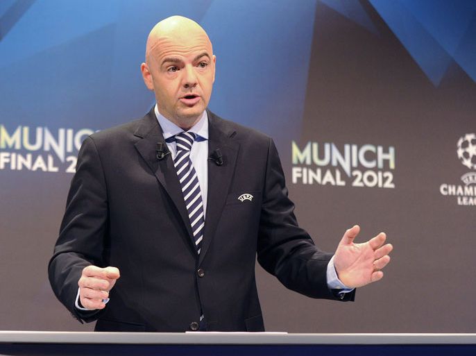 epa03147239 UEFA General Secretary Gianni Infantino speaks during the draw of the UEFA Champions League 2011/12 quarter and semi final matches at the UEFA Headquarters in Nyon, Switzerland, 16 March 2012. EPA/CHRISTIAN BRUN