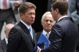 epa03709904 CEO of Russian energy company Gazprom, Alexey Miller (L), leaves the Maximos mansion after a meeting with Greek Prime Minister Antonis Samaras (not pictured), in Athens, Greece, 21 May 2013. Russian energy company Gazprom appears to be the most likely buyer of DEPA, Greece's sole retail gas distributor, according to reports. EPA/ALEXANDROS VLACHOS