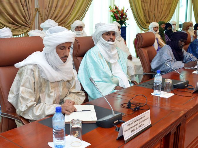Alghabass Ag Intalla (2ndL), leader of the Ansar Dine delegation attends on June 8, 2013 a meeting on the Malian crisis in Ouagadougou, Burkina Faso. Talks between Malian authorities and armed ethnic Tuareg groups, who hold the northeastern town of Kidal, got underway on June 8 after a day's delay