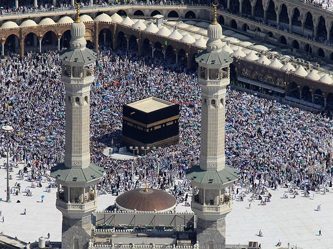 An aerial view shows Muslim pilgrims circumventing around the holly Kaaba located in the center of the Haram Sharif Great Mosque, during the Muslim's Hajj 2012 pilgrimage, Mecca, Saudi Arabia, 27 october 2012. According to the Muslims holly book the Koran, the Kaaba was built by Abraham and his son Ismael, after Ismael had settled in Arabia. EPA/ALAA BADARNEH