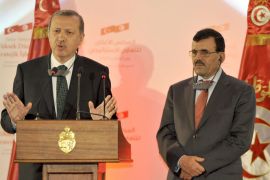 FB629 - Tunis, -, TUNISIA : Turkish Prime Minister Recep Tayyip Erdogan (L) speaks during a joint press conference with his Tunisian counterpart Ali Laarayedh (R) in Tunis on June 6, 2013. Erdogan said that members of a "terrorist organisation" were taking part in deadly anti-government protests sweeping Turkey and refused to cancel a controversial Istanbul development plan that sparked them. AFP PHOTO / FETHI BELAID