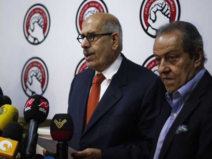 EGYPT : Nobel Peace prize laureate and Egyptian opposition National Salvation Front leader Mohamed El Baradei (L) gives a press conference on June 27, 2013 in Cairo. Opponents of Egypt's President Mohamed Morsi are pressing ahead with plans to stage mass rallies against the Islamist leader after he marked his turbulent first year in office with a defiant speech