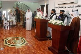 Muhammad Naeem (2nd R), a spokesman for the Office of the Taliban of Afghanistan, stands next to a translator speaking during the opening of the Taliban Afghanistan Political Office in Doha June 18, 2013. The Afghan Taliban opened the office in Qatar on Tuesday to help restart talks on ending the 12-year-old war, saying it wanted a political solution that would bring about a just government and end foreign occupation. Taliban representative Naeem told a news conference at the office in the capital Doha that the Islamist insurgency wanted good relations with Afghanistan's neighbouring countries. REUTERS/Mohammed Dabbous (QATAR - Tags: POLITICS)