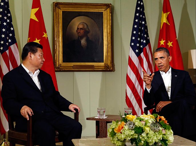 U.S. President Barack Obama meets with Chinese President Xi Jinping at The Annenberg Retreat at Sunnylands in Rancho Mirage, California June 7, 2013. Obama said on Friday he welcomed the "peaceful rise" of China and that, despite inevitable areas of tension, both countries want a cooperative relationship, as he and Chinese President Xi Jinping kicked off two days of meetings. REUTERS/Kevin Lamarque (UNITED STATES - Tags: POLITICS)
