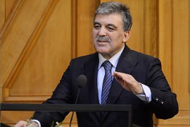 Turkey's President Abdullah Gul gestures as he gives a speech at the Swedish Parliament in Stockholm on the third and last day of his official three day visit in Sweden on March 13, 2013. Swedish Prime Minister Fredrik Reinfeldt on March 12, 2013 called on Turkey to overhaul its terrorism laws, used by the country's courts to jail journalists, as he met with President Abdullah Gul. AFP PHOTO/JONATHAN NACKSTRAND
