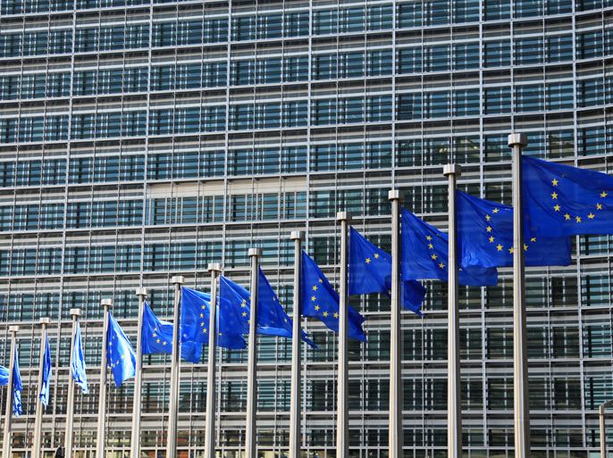 epa03264431 Illustration Picture showing the EU flags in front of the European Commission headquarters in Brussels, Belgium, 14 June 2012. EPA/OLIVIER HOSLET