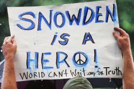 New York, New York, UNITED STATES : NEW YORK, NY - JUNE 10: A supporter holds a sign at a small rally in support of National Security Administration (NSA) whistleblower Edward Snowden in Manhattan's Union Square on June 10, 2013 in New York City. About 15 supporters attended the rally a day after Snowden's identity was revealed in the leak of the existence of NSA data mining operations. Mario Tama/Getty Images/AFP== FOR NEWSPAPERS, INTERNET, TELCOS & TELEVISION USE ONLY ==
