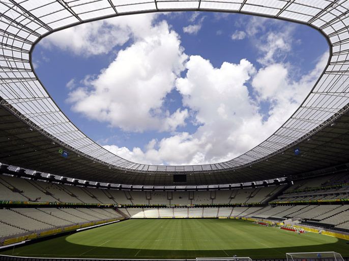 epa03748944 General view of the Arena Castelao stadium in Fortaleza, Brazil, 17 June 2013. Brazil and Mexico will face each other on 19 June 2013 in their FIFA Confederations Cup 2013 soccer match at Castelao stadium, which will be one of the official stadiums for the FIFA 2014 Soccer World Cup. EPA/ROBERT GHEMENT