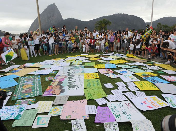 Children participate in a demonstration supporting democracy and protesting against police violence on June 23, 2013 in Rio de Janeiro, Brazil. Brazil braced for more mass protests Sunday a day after a poll showed most people back demands for improvements to crumbling public services and for wide-ranging institutional reform