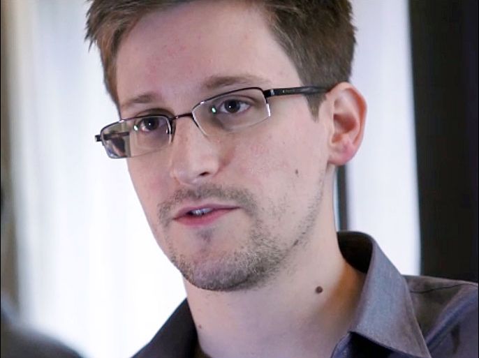 This still frame grab recorded on June 6, 2013 and released to AFP on June 10, 2013 shows Edward Snowden, who has been working at the National Security Agency for the past four years, speaking during an interview with The Guardian newspaper at an undisclosed location in Hong Kong. Snowden, who has said he wants to apply for asylum in Russia, is studying his options and likely to make a decision shortly, a lawyer said on July 16, 2013. AFP PHOTO / THE GUARDIAN