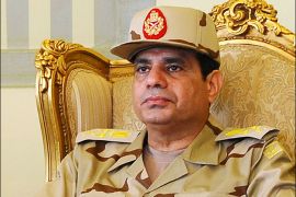 Egypt's Defense Minister Abdel Fattah al-Sisi is seen during a news conference in Cairo on the release of seven members of the Egyptian security forces kidnapped by Islamist militants in Sinai, in this May 22, 2013 file picture. To match Special Report EGYPT-PROTESTS/DOWNFALL REUTERS/Stringer/Files (EGYPT - Tags: MILITARY HEADSHOT POLITICS)