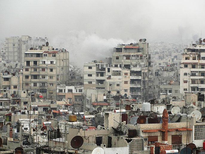 ‪الأحياء القديمة في مدينة حمص تتعرض‬ لقصف مدمر منذ شهور (رويترز)
