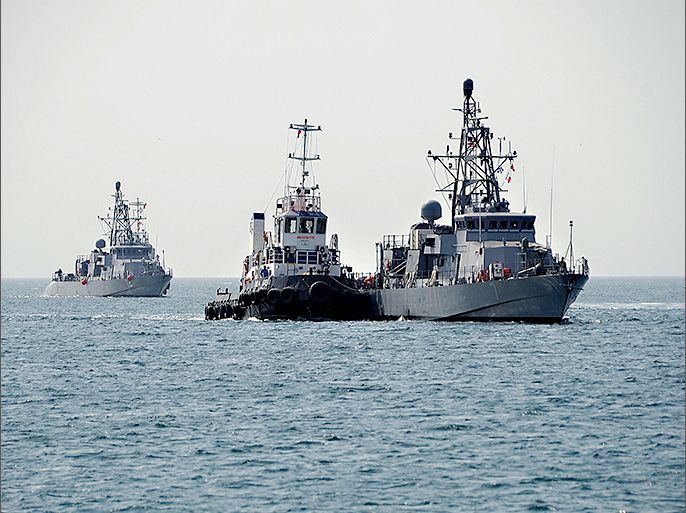 The US patrol Coastal ships USS Thunderbolt (PC 12) (L)and USS Squall (PC 7) (R) transit from Khalifa Bin Salman Port to Mina Salman Pier July 3, 2013 near Bahrain. The arrival of Tempest, USS Thunderbolt (PC 12) and USS Squall (PC 7) brings the total number to eight PCs here to support maritime security operations and theater security cooperation efforts in the US 5th Fleet area of responsibility. AFP PHOTO / HO / US NAVY / MCS1 (SW) Stephen Murphy == RESTRICTED TO EDITORIAL USE / MANDATORY CREDIT: "AFP PHOTO /US NAVY / MC1(SW) Stephen Murphy/ NO SALES / NO MARKETING / NO ADVERTISING CAMPAIGNS / DISTRIBUTED AS A SERVICE TO CLIENTS ==