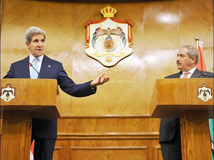 US Secretary of State John Kerry speaks during a joint press conference as Jordan's Foreign Minister Nasser Judehlooks on, on July 17, 2013 at the Ministry of Foreign Affairs in Amman. Kerry met with Arab League officials to discuss his push to thaw out the frozen peace process, as Palestinians said there had been progress. AFP PHOTO/Mandel NGAN-POOL