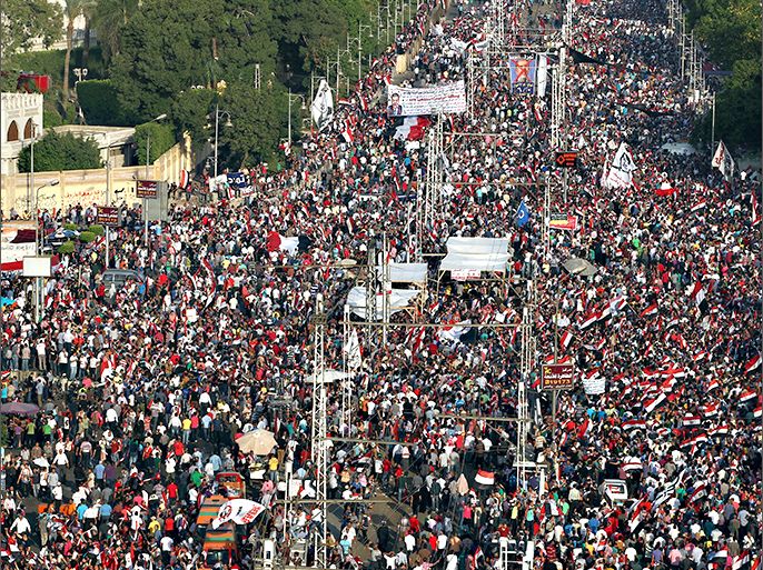 epa03768193 A general view of Egyptians opposing President Morsi taking part in a protest demanding him to leave office, in front of the presidential palace in Cairo, Egypt, 30 June 2013. Tens of thousands of Egyptians took to the streets in rival rallies on 30 June, as the opposition demanded Islamist President Mohammed Morsi step down on his first anniversary in office. Tensions between Morsi's supporters and his opponents have risen in the lead-up to the anniversary, with at least seven killed in clashes last week. EPA/KHALED ELFIQI