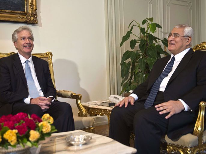 Egypt's interim president Adly Mansour (R) meets with US Deputy Secretary of State William Burns in the presidential palace in Cairo on July 15, 2013. The senior US official was in Cairo to press for a return to elected government following Mohamed Morsi's overthrow, as the Islamist leader's supporters and opponents readied rival rallies.