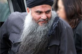 (FILES) In this file picture taken on November 13, 2012 radical Jordanian cleric Abu Qatada arrives at his home in northwest London , after he was released from prison. Jordan's parliament has approved an agreement with Britain on extraditing