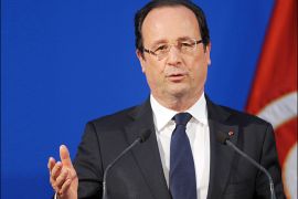 French President Francois Hollande gives a speech at the closing of the Chiefs Council of Franco-Tunisian Enterprises at the headquarters of Tunisia's union of industry, commerce and crafts (UTICA) in Tunis, on July 5, 2013. Hollande, whose two-day trip to Tunisia is the first by a French president since the January 2011 revolution that ousted veteran strongman and former French ally Zine El Abidine Ben Ali, expressed words of encouragement for Islamist-ruled country. AFP PHOTO / FETHI BELAID