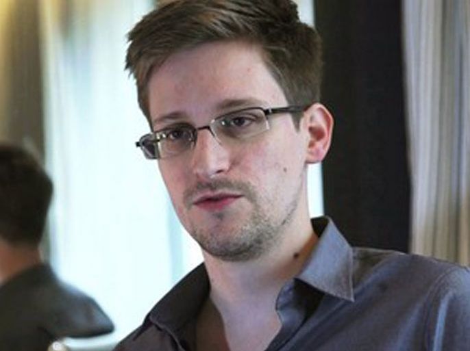 NSA whistleblower Edward Snowden, an analyst with a U.S. defence contractor, is seen in this still image taken from video during an interview by The Guardian in his hotel room in Hong Kong June 6, 2013. Bolivia accused the United States on July 3, 2013, of trying to "kidnap" its president, Evo Morales, after his plane was denied permission to fly over some European countries on suspicion he was taking fugitive former U.S. spy agency contractor Snowden to Latin America. Snowden was not on the plane when it landed in Vienna, an Austrian official said. He is believed to be stranded in the transit lounge of a Moscow airport and the United States has been trying to get its hands on him since he revealed details of its secret surveillance programs last month. Picture taken June 6, 2013