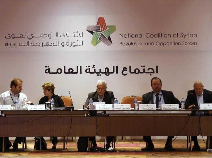 George Sabra, a veteran Christian opposition figure and acting President of the Syrian National Coalition, (C) chairs a meeting in Istanbul July 4, 2013. Syria's fractious opposition coalition meets on Thursday under pressure to name a new leader and prove to its Western and Arab backers