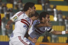Zamalek players celebrate after scoring a goal against derby rivals Al Ahly during their CAF Champions League soccer match at El-Gouna stadium in Hurghada, about 464 km (288 miles) from the capital Cairo July 24, 2013.