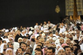 Muslim pilgrims walk around the holy Kaaba (behind black) as they perform the lesser pilgrimage, Known as Omra, in the holy city of Mecca in western Saudi Arabia, on June 17, 2012.