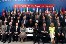 epa03794206 Central bankers and Finance Ministers wait Russian Finance Minister Anton Siluanov for a group photo during the G20 Finance Ministers and Central Bank Governor's Meeting 2013 in Moscow, Russia, 20 July 2013. Central bankers and Finance Ministers from the G20 countries hold a two-day meeting with talks expected to focus on measures to prevent large companies from shifting their profits to tax havens. EPA/MAXIM SHIPENKOV