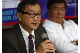 03392144 Cambodian opposition party leader Sam Rainsy (L) speaks during a press conference in San Juan City, east of Manila, Philippines 10 September 2012. Rainsy, who is on exile in France and has called for democratic reforms in the coming July 2013 elections in Cambodia, joined Philippine Senator Franklin Drilon in launching the International Parliamentary Committee for Democratic Elections in Cambodia. EPA/ROLEX DELA PENA