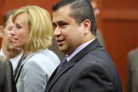 George Zimmerman leaves the courtroom a free man after being found not guilty, on the 25th day of his trial at the Seminole County Criminal Justice Center July 13, 2013 in Sanford, Florida. Zimmerman was charged with second-degree murder in the 2012 shooting death of Trayvon Martin. AFP PHOTO