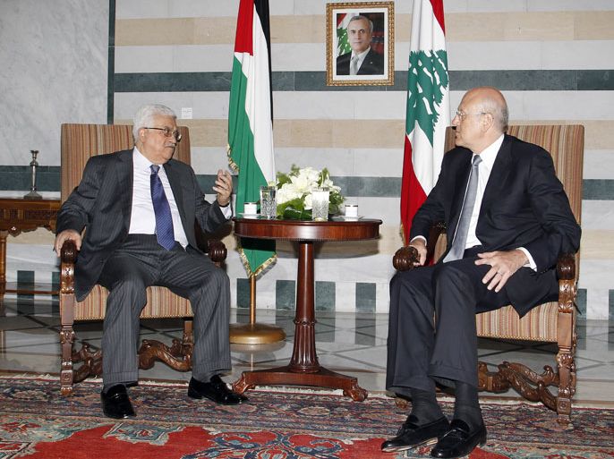 epa03774621 Lebanese Prime Minister Najib Mikati (R) meets with Palestinian President Mahmoud Abbas (L) at the Government palace in Beirut, Lebanon, 04 July 2013. Abbas arrived in Beirut on 03 July for a three-day official visit to meet with the Lebanese officials. EPA/NABIL MOUNZER