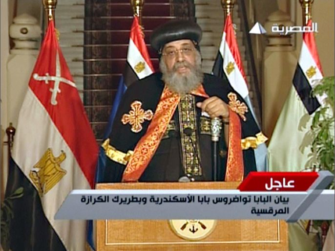An image grab taken from Egyptian state TV shows the leader of Egypt's Coptic Christians Pope Tawadros II delivering a statement on July 3, 2013, following the announcement of the ousting of Islamist President Mohamed Morsi. AFP PHOTO/EGYPTIAN TV == RESTRICTED TO EDITORIAL USE - MANDATORY CREDIT "AFP PHOTO / EGYPTIAN TV" - NO MARKETING NO ADVERTISING CAMPAIGNS - DISTRIBUTED AS A SERVICE TO CLIENTS ===