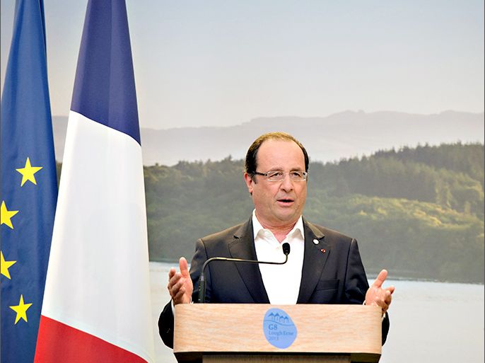 France's President Francois Hollande speaks during a press conference at the end of the G8 summit at the Lough Erne resort near Enniskillen in Northern Ireland on June 18, 2013. G8 leaders on Tuesday threw their weight behind calls for a peace conference on Syria to be held in Geneva "as soon as possible", after a summit dominated by the country's civil war. French President Francois Hollande said that Iranian president-elect Hassan Rowhani would be welcome at Syria peace talks "if he can be useful". AFP PHOTO / BERTRAND LANGLOIS