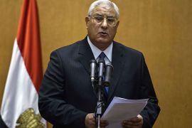 TOPSHOTSEgypt's chief justice Adly Mansour delivers a speech during his swearing-in ceremony as the country's interim president in the Supreme Constitutional Court. in Cairo on July 4, 2013, a day after the military ousted and detained Mohamed Morsi following days of massive protests. The ceremony, which was broadcast live on national television, came after the military swept aside Morsi on Wednesday, a little more than a year after the Islamist leader took office. AFP PHOTO / KHALED DESOUKI