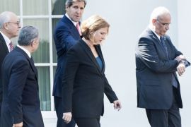 US Secretary of State John Kerry (C) leaves the West Wing of the White House with chief negotiators, Israeli Minister of Justice Tzipi Livni (2R) and chief Palestinian negotiator (R) and others, after a meeting with US President Barack Obama July 30, 2013 in Washington, DC.
