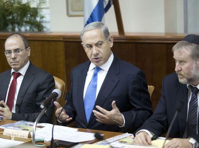 EPA02 - JERUSALEM, -, - : Israeli Prime Minister Benjamin Netanyahu speaks during the weekly cabinet meeting in his Jerusalem office, on July 14, 2013 . AFP PHOTO/ABIR SULTAN-POOL