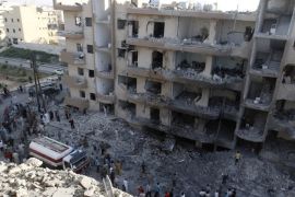A general view shows damaged buildings caused by what activists said was shelling by forces loyal to Syrian President Bashar al-Assad in Raqqa province, eastern Syria, August 7, 2013.